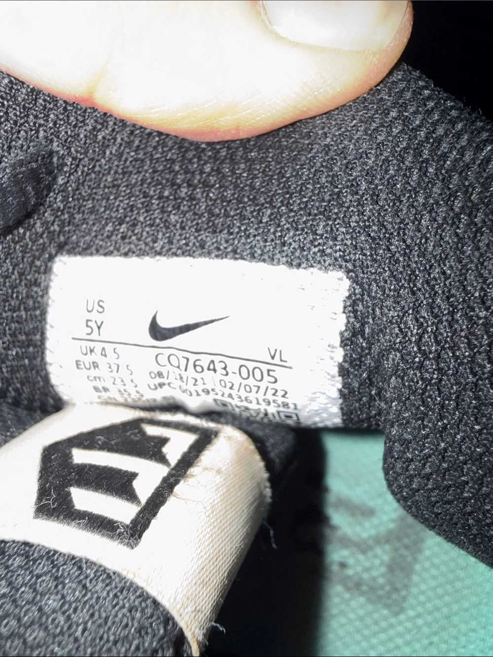 Nike Black and White Kids Cleats